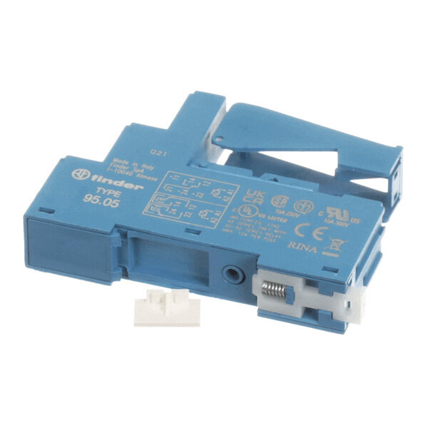 A blue electrical relay base with white connector components and various technical markings on its surface.