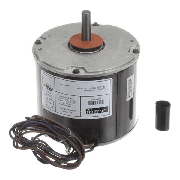 A cylindrical electric motor with a protruding shaft, attached wires, and a label on the side, shown alongside a small cylindrical cap.