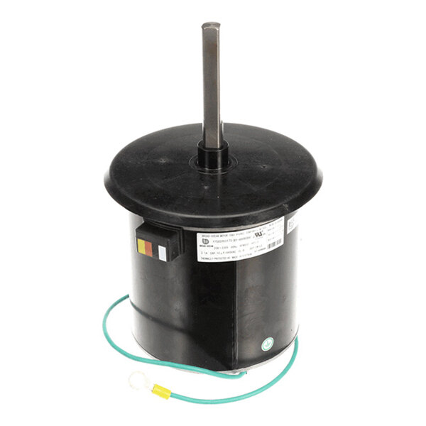 A cylindrical black motor with a central vertical shaft, a label, and a green wire attached at the base.