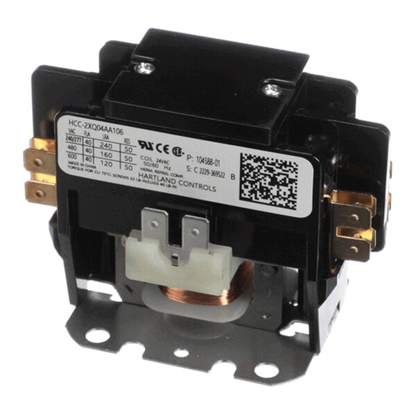 A black and metallic electrical contactor with multiple terminals, a visible copper coil, and a label displaying technical specifications.