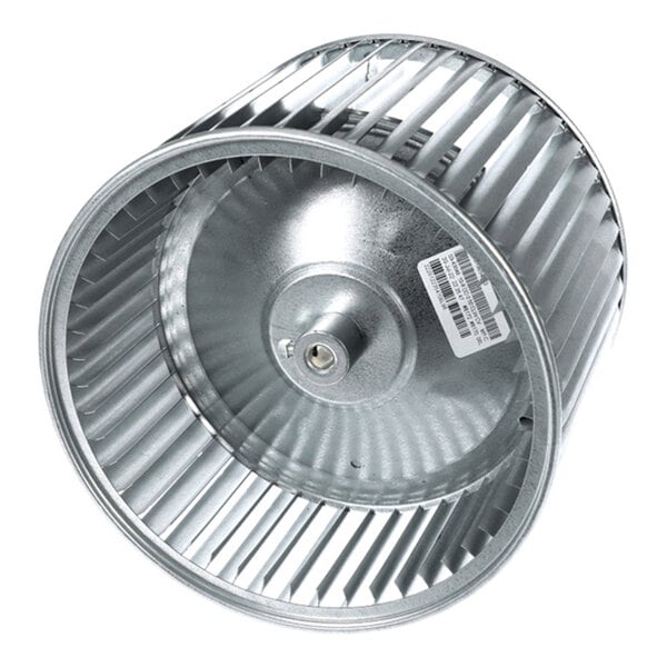 A metal cylindrical blower wheel with evenly spaced blades and a central hub, featuring a barcode sticker on one side.