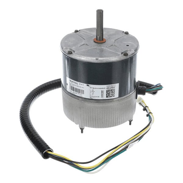 A cylindrical electric motor with a central shaft, attached wiring, and a label with barcodes and specifications.
