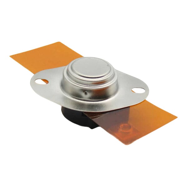 A metallic component with a round, raised center and two mounting holes, attached to an orange rectangular strip.