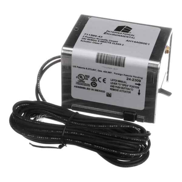 A metal electrical actuator box with a label, attached black cable, and a small lever on the side.