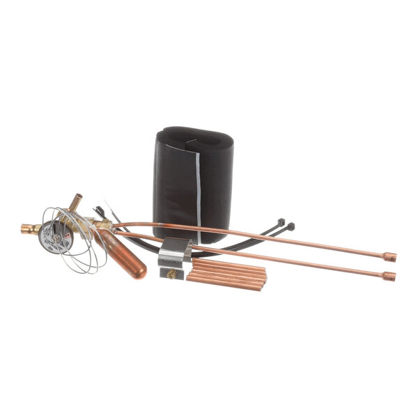 A set of copper tubes, a valve assembly with attached wires, a black foam insulation wrap, and mounting accessories displayed on a white background.