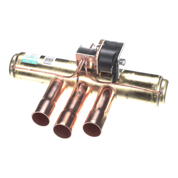 A metallic valve assembly with three copper pipe connections and an attached coil component.