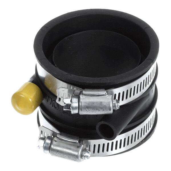 A black rubber coupling with two metal hose clamps and attached plastic fittings, including a yellow-capped port.