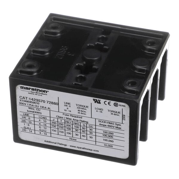 A black rectangular electrical terminal block with three poles and a label displaying technical specifications and ratings.