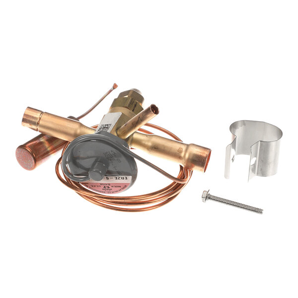 A copper and brass thermostatic expansion valve assembly with attached capillary tube, a metal clamp, and a screw.