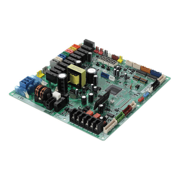 A green printed circuit board with various electronic components, connectors, and capacitors mounted on it.