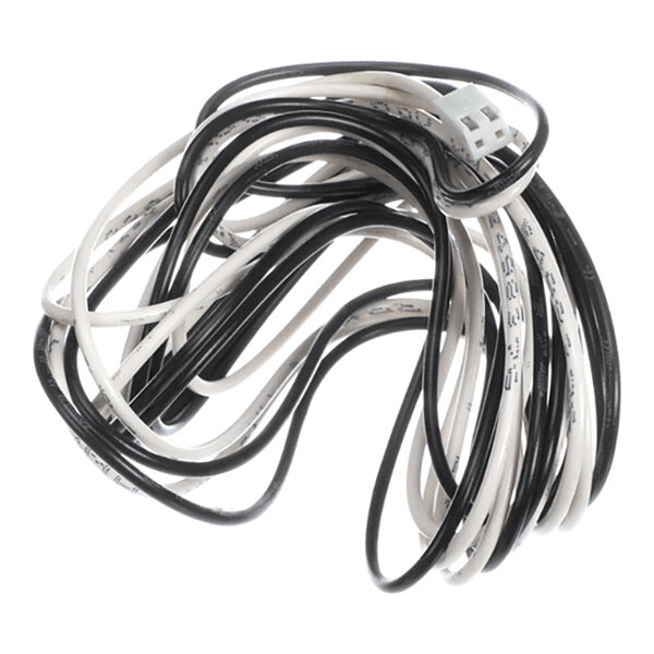 A bundle of black and white electrical wires with a white plastic connector at one end.