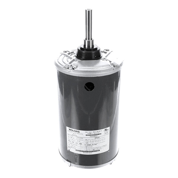 A cylindrical electric motor with a metal shaft protruding from the top and a label with technical specifications on the side.