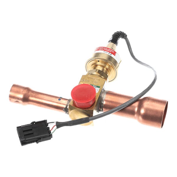 A brass and copper valve with an attached electrical wire and connector, featuring a red cap on one side.