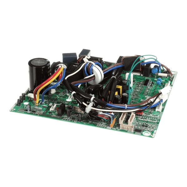 A green electronic circuit board with various components, wires, and connectors attached.