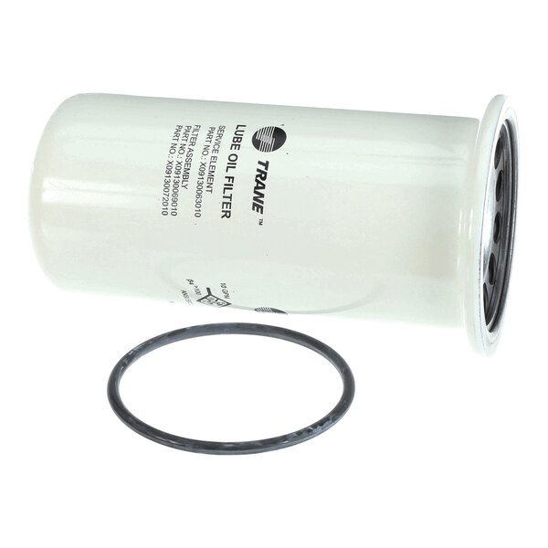 A cylindrical white oil filter with printed text and a separate circular rubber gasket.