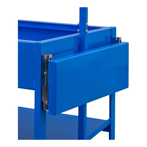 A close-up view of a blue metal folding shelf attached to a larger frame structure.
