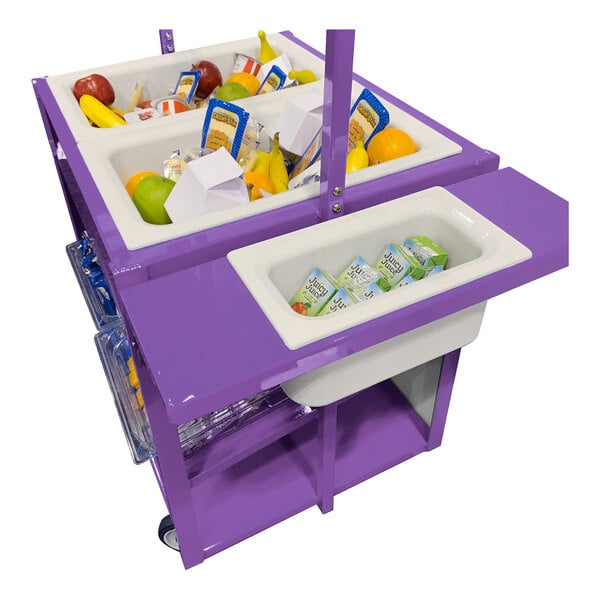 A purple rolling cart with multiple white bins containing assorted fruits, juice boxes, and packaged items.