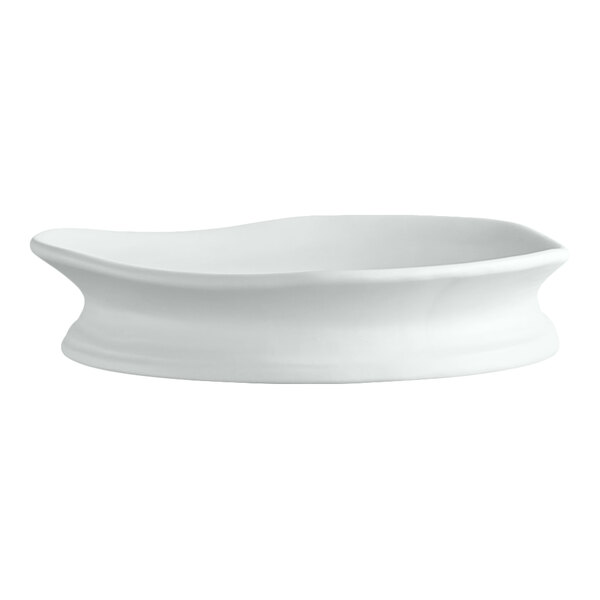A white, round plate with a slightly wavy rim and a raised base.