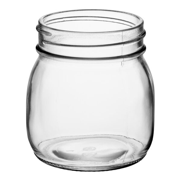 A clear, empty glass jar with a wide mouth and screw threads near the top.