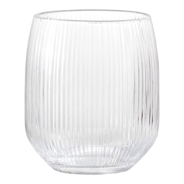 A clear glass tumbler with vertical ribbed texture and a rounded shape.