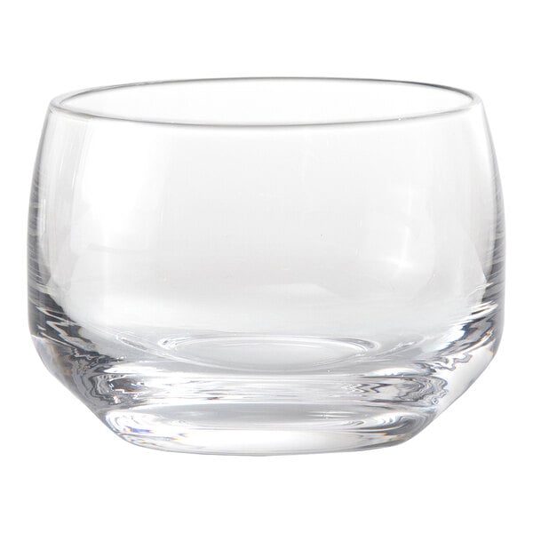 A clear, short glass tumbler with smooth, rounded sides and a thick base.