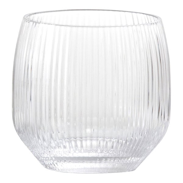 A clear glass with a rounded shape and vertical ribbed texture.