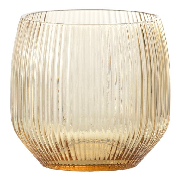 A transparent, amber-tinted glass with vertical ribbed texture and a rounded shape.