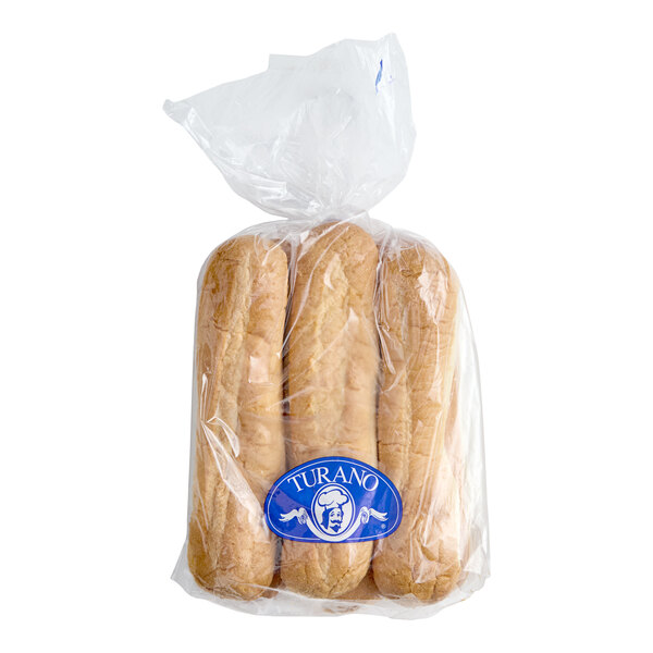 A package of four long sandwich rolls in a clear plastic bag with a blue label on the front.