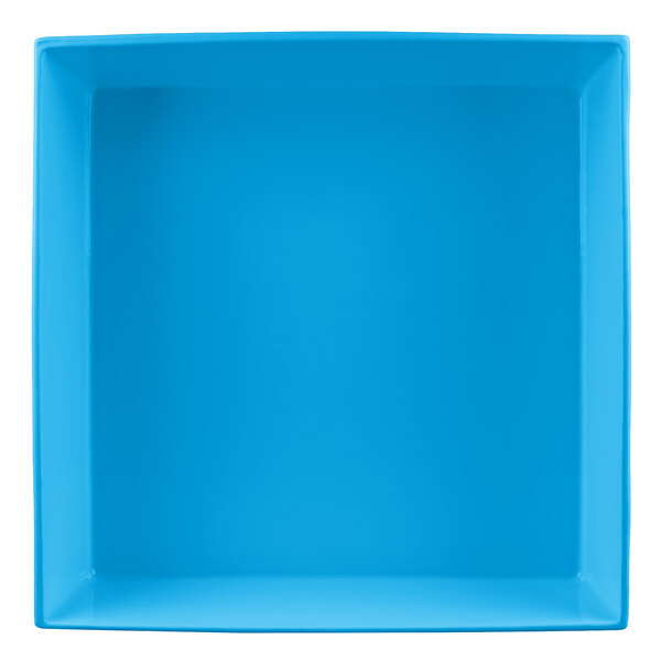 A blue square Tablecraft cast aluminum bowl with a white background.