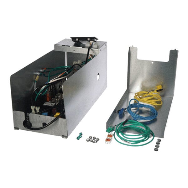 A metal enclosure with internal wiring and components, accompanied by a metal cover, several colored cables, connectors, and small hardware pieces arranged on a white background.