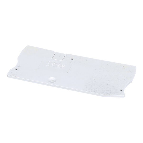 A rectangular, flat, white plastic cover with rounded edges and small holes, showing some surface wear and markings.