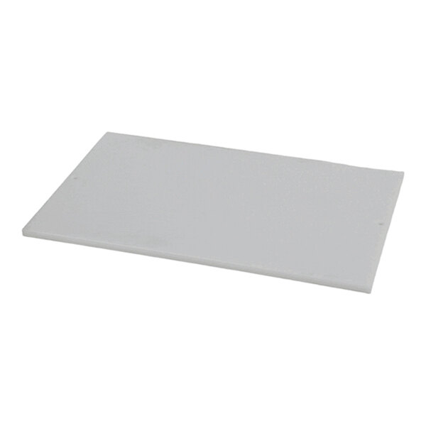 A rectangular, flat, white or light gray board with smooth surfaces, viewed at an angle against a plain background.