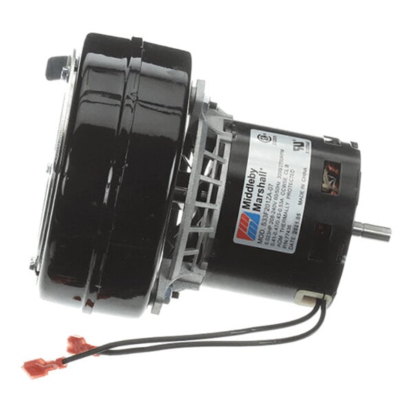 A black cylindrical electric motor with attached wiring and a label, viewed from the side.