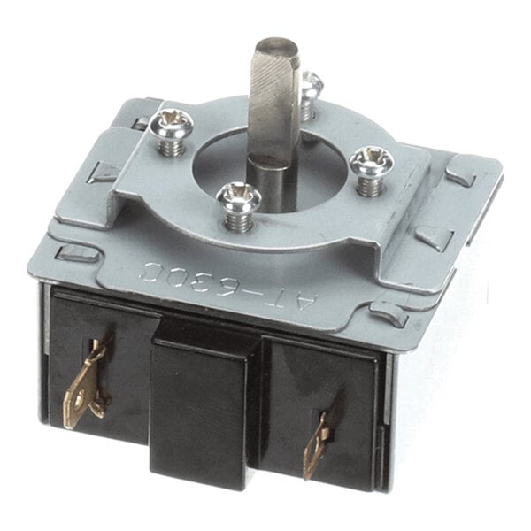A metal and plastic timer component with a central rotating shaft, four mounting screws, and two electrical terminals.