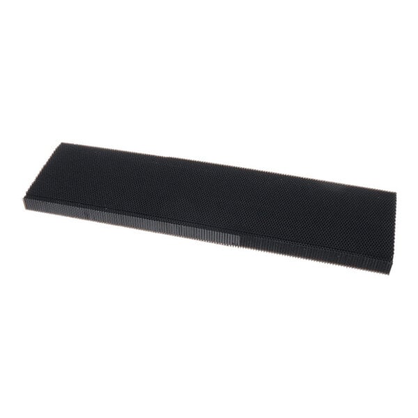 A rectangular black panel with a textured surface, viewed at an angle against a white background.