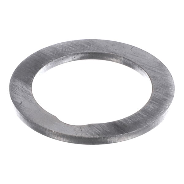 A flat, circular metal shim with a central hole and a small notch on the inner edge.