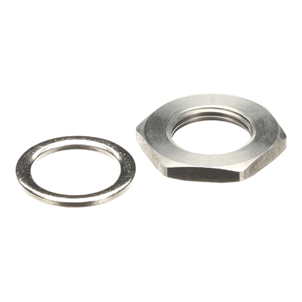 A metal washer and a hexagonal metal nut placed side by side on a white background.