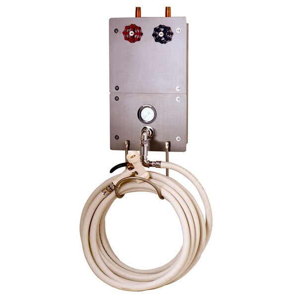 A T&S washdown station with a recessed cabinet and hose rack.