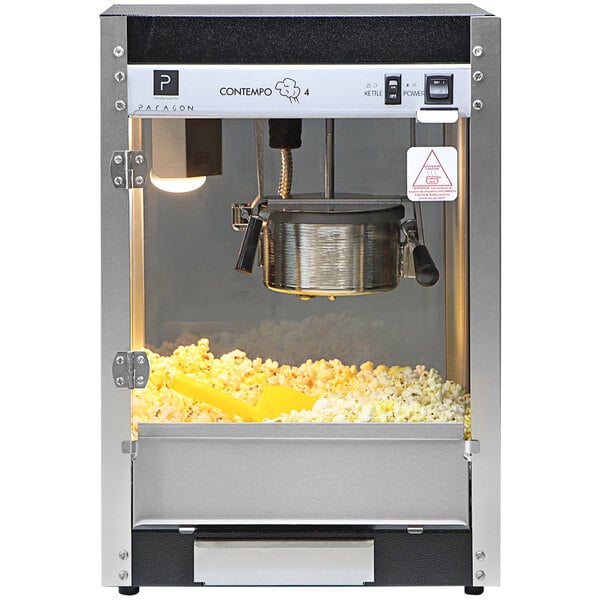 A Paragon Contempo Pop popcorn machine with popcorn in it.