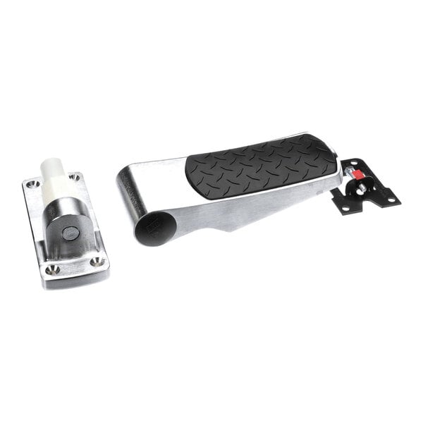 A metal hinge assembly with a textured black rubber pad and a separate mounting component, both designed for heavy-duty use.
