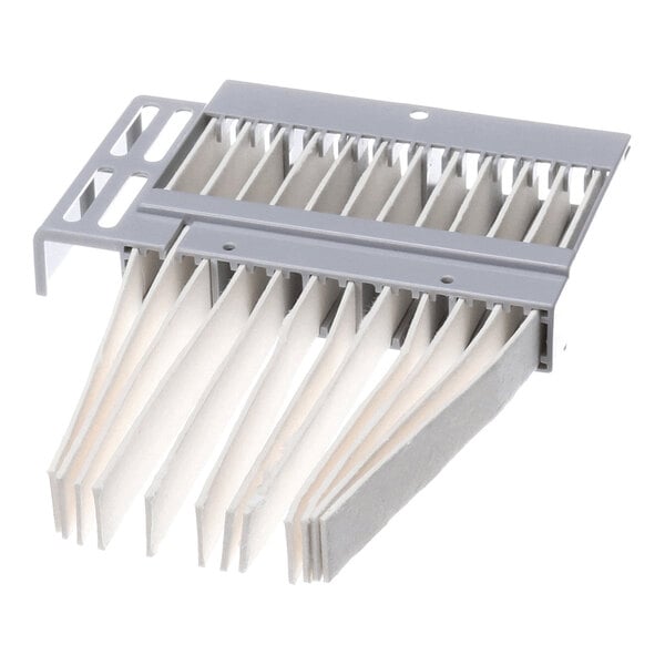 A gray plastic frame holding several white, pleated absorbent paper strips.