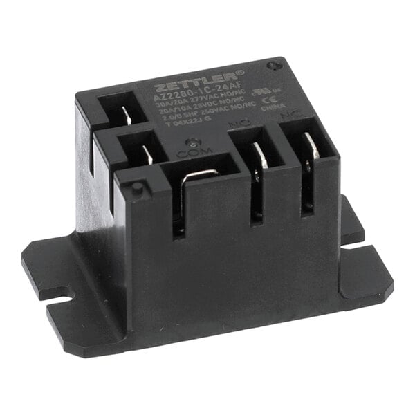 A black rectangular electrical relay with multiple metal terminals and labeled connection points (COM, NO, NC) on its surface.