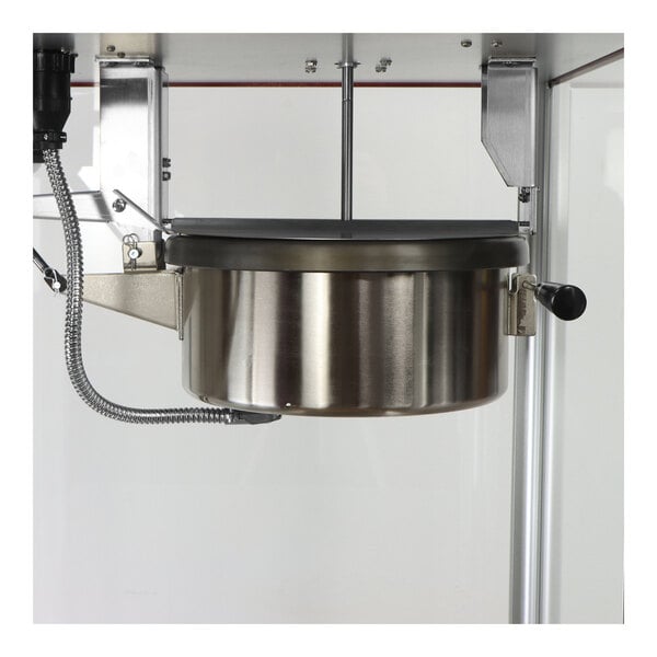A large stainless steel pot with a black handle.