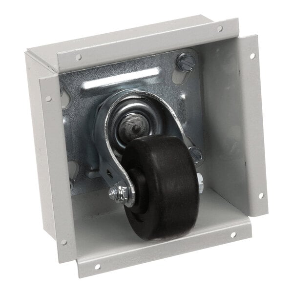 A metal recessed frame containing a single black swivel caster wheel mounted inside.