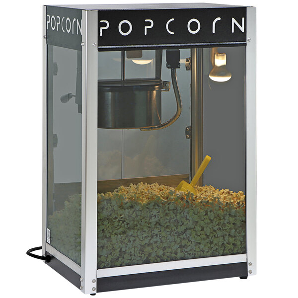 A Paragon Contempo Pop popcorn machine with a bowl of popcorn and a scoop.