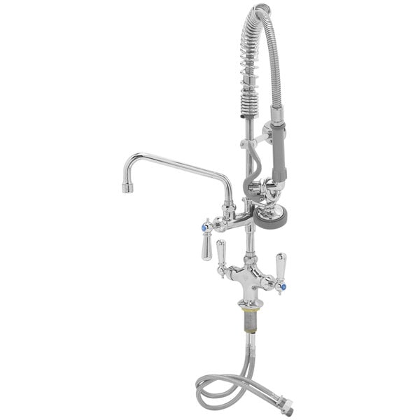A close-up of a chrome T&S pre-rinse faucet with hoses.