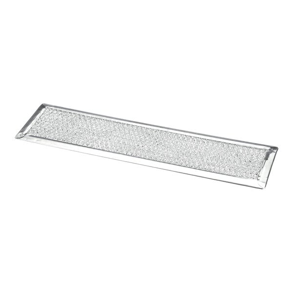 A rectangular, metallic mesh filter with a solid frame, viewed at an angle against a white background.