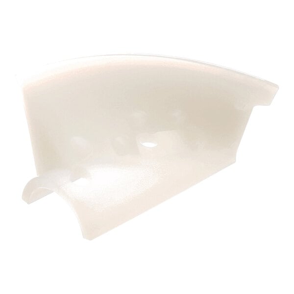 A translucent, curved plastic component with a smooth surface and several rounded indentations.