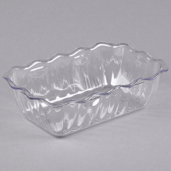 A clear, rectangular plastic container with wavy edges and a smooth, glossy surface.
