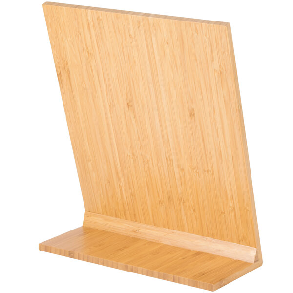 A wooden, angled display stand with a flat base and a vertical back panel, likely made of bamboo.